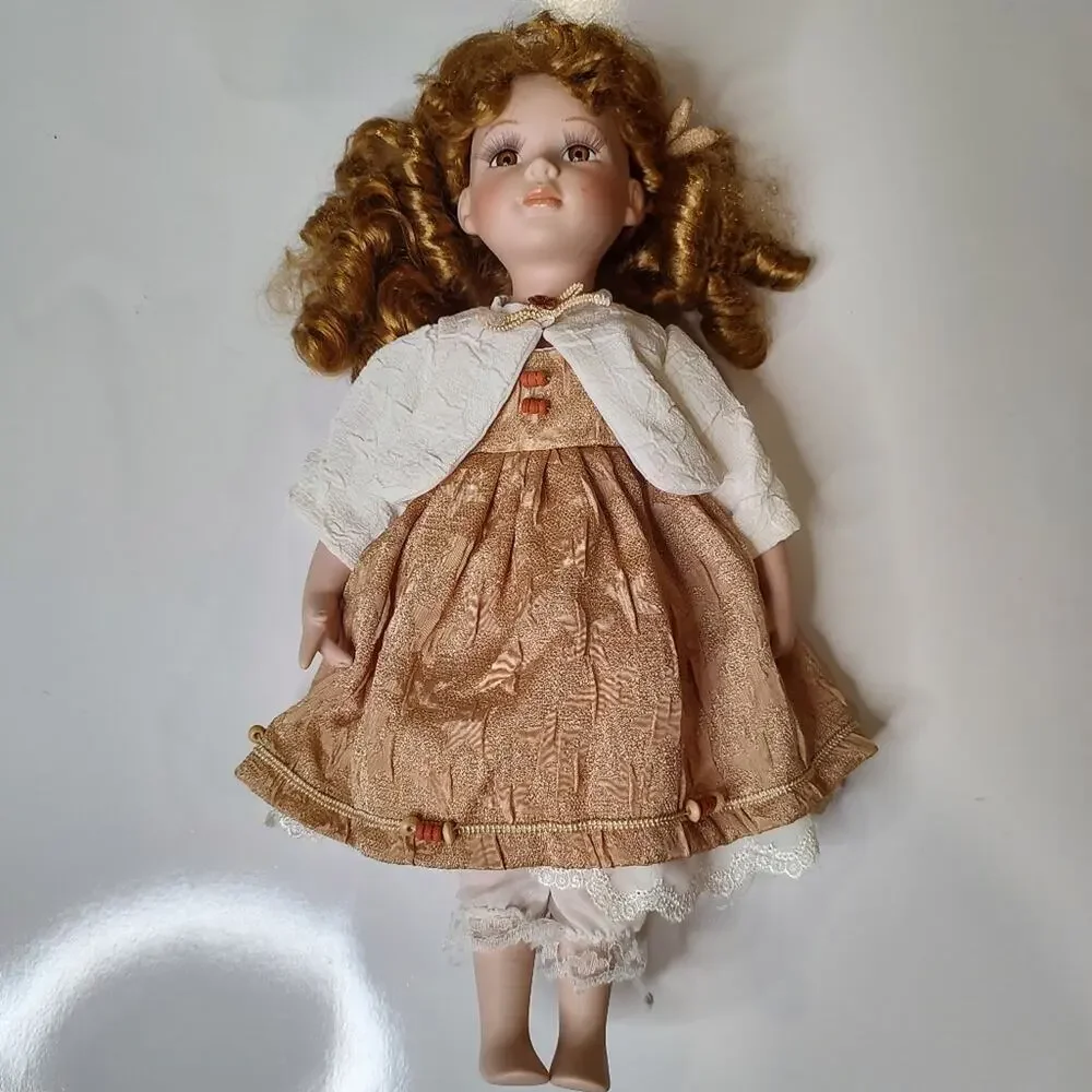 Vintage Porcelain Doll Strawberry Blond Curly Hair Brown Eyes